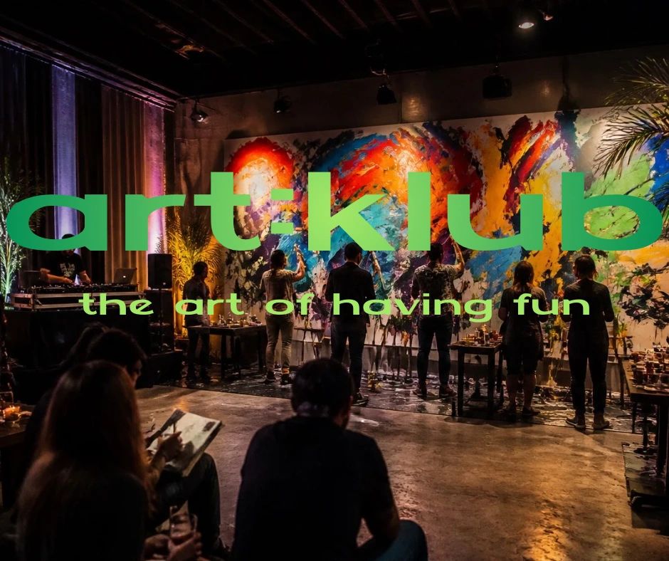 Revellers enjoying art music food and drink