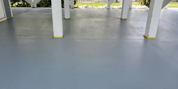 Picture of a clean and refreshed concrete patio after it was professionally sealed. 
