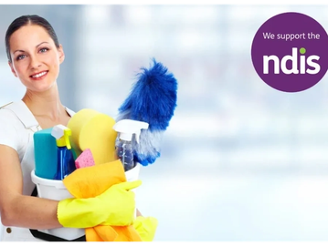 Smiling woman holding cleaning supplies with NDIS support logo.
