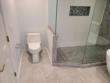 New one piece toilet installation with new wax ring, toilet supply, and toilet bolts.   