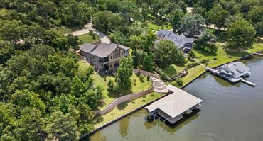 Aerial View From North East of Property Over the Lake
