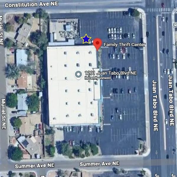 Aerial view of Family Thrift Center at 1201 Juan Tabo Blvd NE with parking lot and surrounding streets.