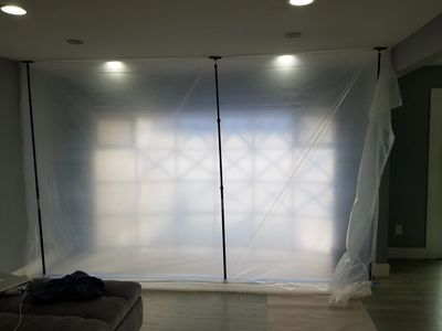 House MD Keeps dust at bay with the use of Dust control barrier by Zipwall.