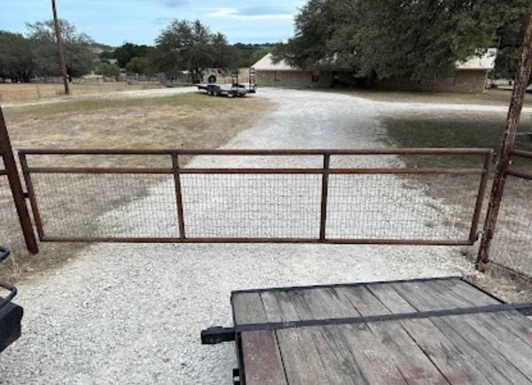 This simple country gate was made to match the fence and entrance that was already in place. 