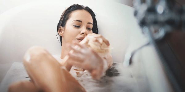 Lady relaxing in spa bath