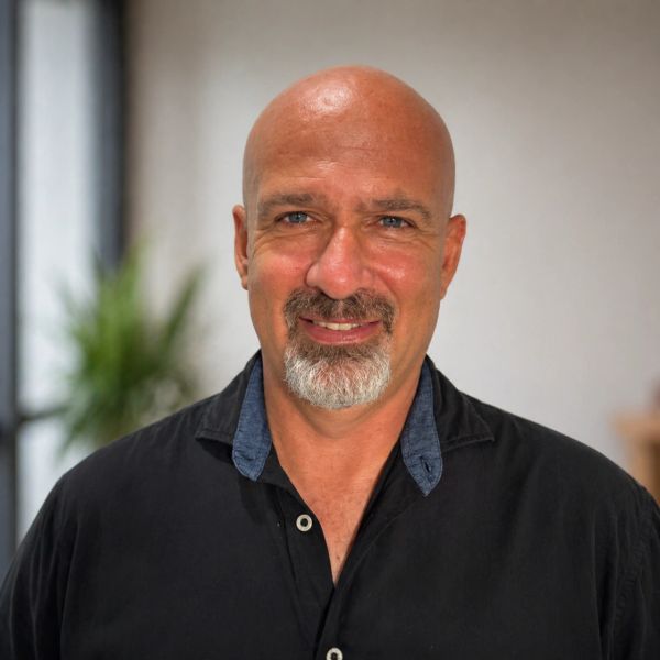Professional headshot of Mason L. McIntyre, Founder of Estrea Solutions, with over 20 years of indus