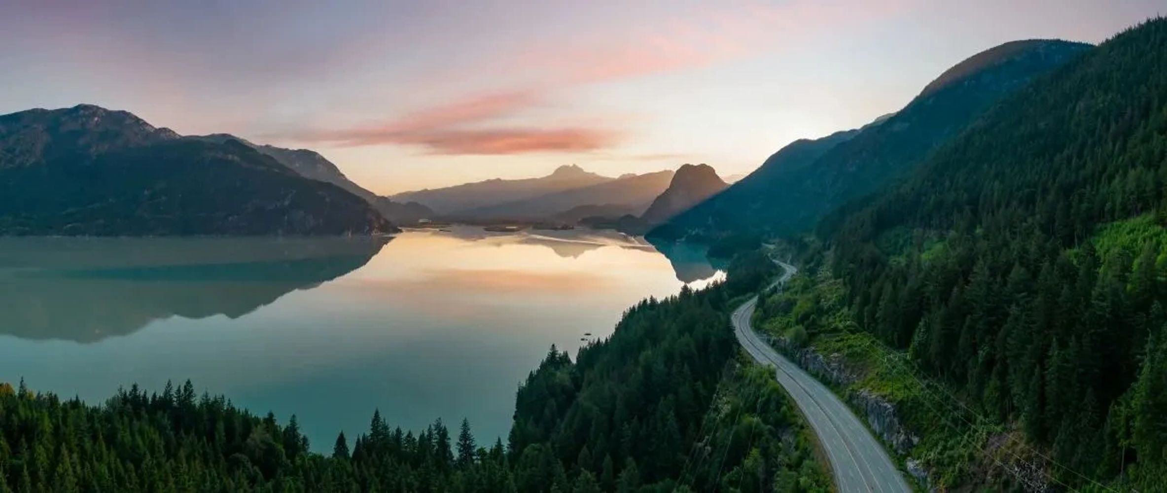 BC mountains sunrise symbolizing Estrea Solutions HR consulting for industrial and trades employers.