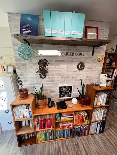 A fully organized office space by Miss Clear Clutter, professional organizer. Image shows books on s