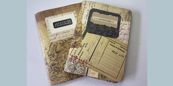 Two vintage notebooks with travel and adventure-themed covers.
