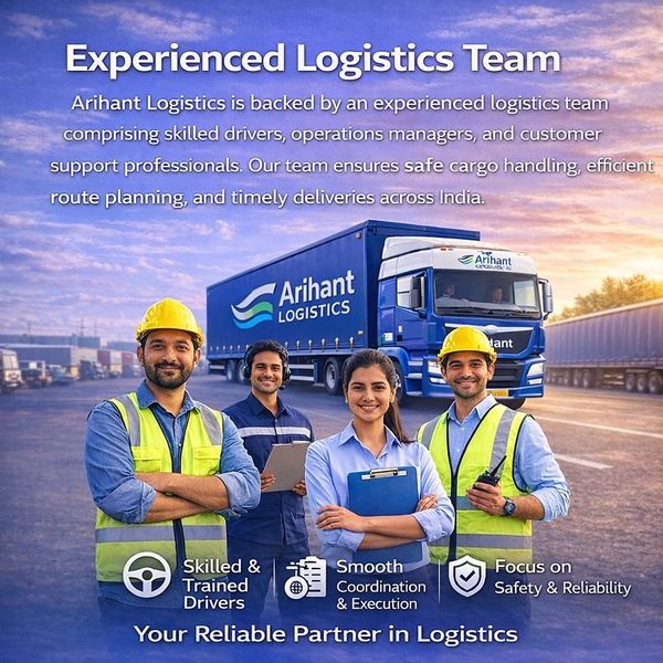 A skilled logistics team stands confidently in front of Arihant Logistics trucks.