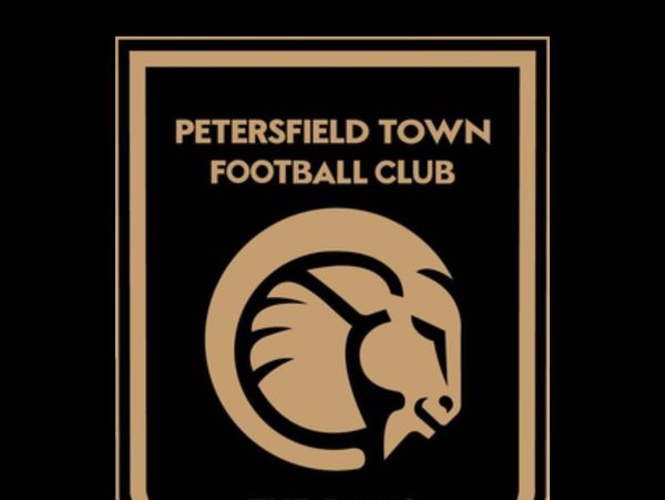 Logo of Petersfield Town Football Club featuring a stylized ram's head.