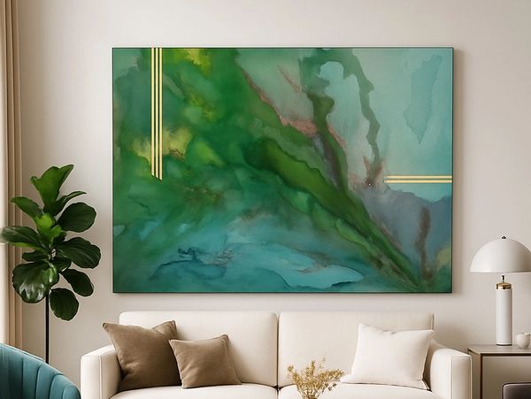 Abstract green and blue wall art above a beige sofa in a modern living room.