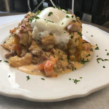 A creamy dish with a poached egg