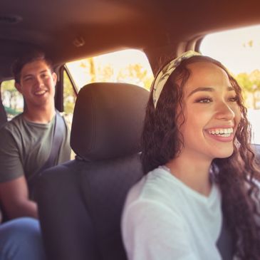 College students riding w driver 