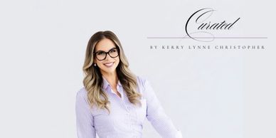 Smiling woman with glasses posing confidently.