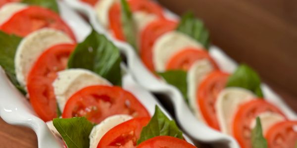 Fresh Caprese salad with basil, tomato, and mozzarella – Century Farm Catering
