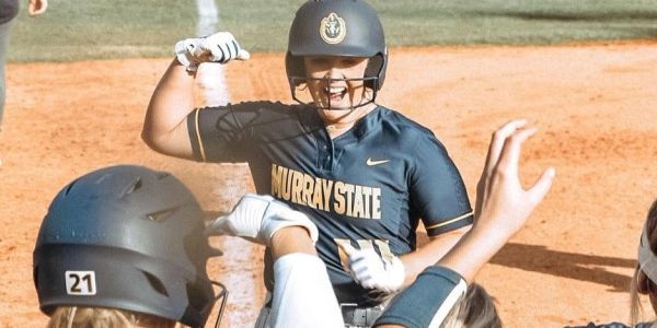 Murray State softball player celebrating on the field.