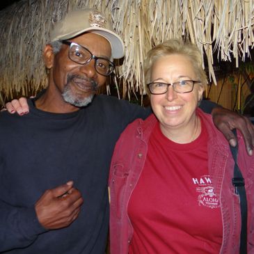 This is my friend John and myself .  When he retired, I made him a Quilt!
