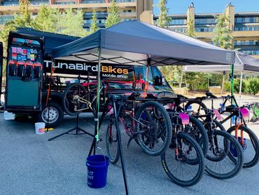 bike race in Bellingham Washington. Bike mechanic working on bikes. Bike shop near Bellingham, 98225