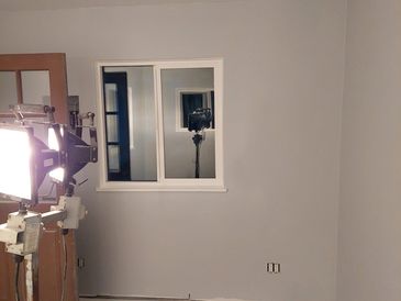Installed cornerbead around the window and patched and painted the drywall.