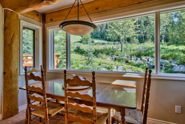Kitchen seating looks out to connector run and 
blazer run,  Incredible wildlife viewing in summer.