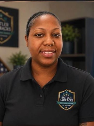 Portrait of a woman wearing a Butler Barracks polo shirt.