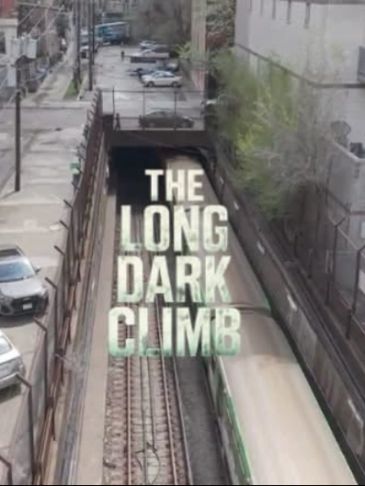 Train entering a dark tunnel with title text overlay.
