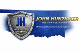 THE JOHN HUNZICKER AGENCY