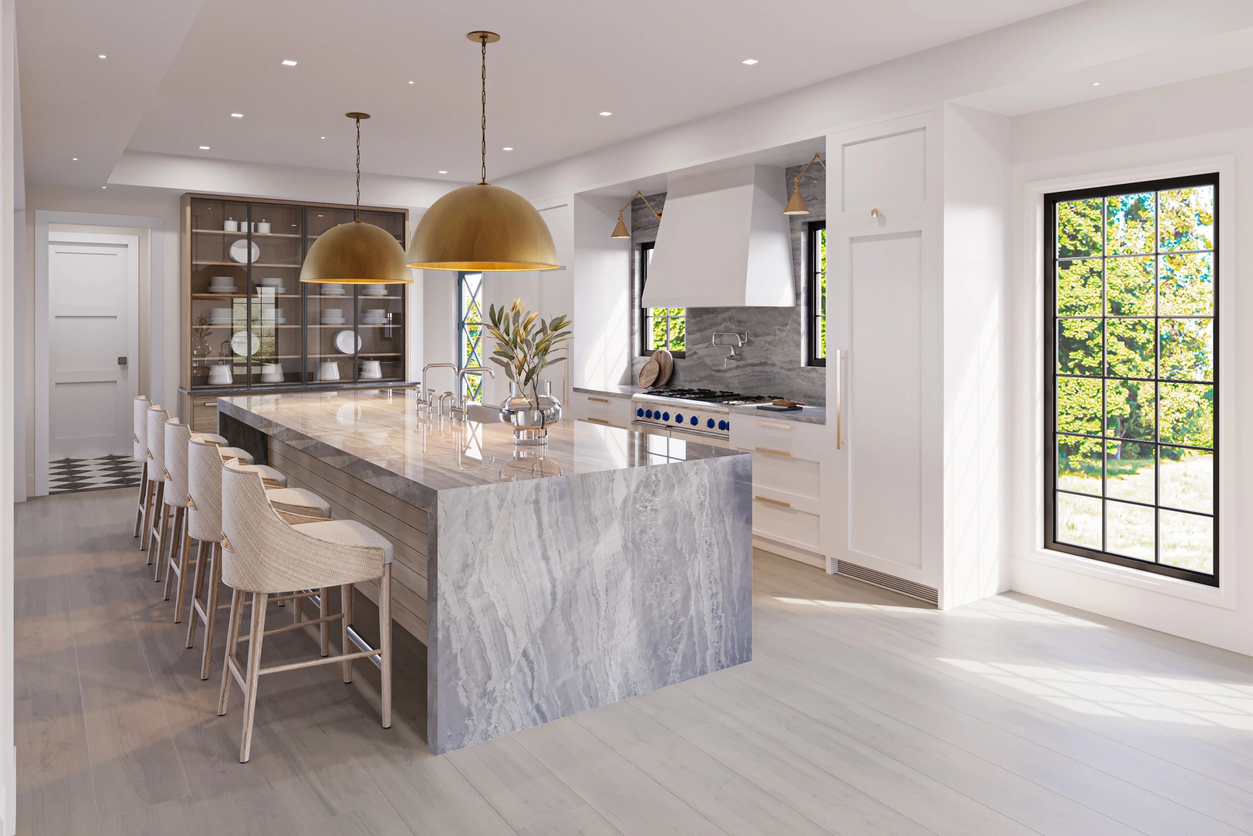 Modern kitchen with marble island and brass pendant lights.