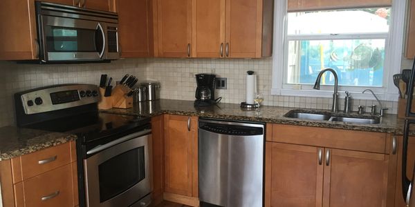 Full Kitchen with granite counters in our vacation home rental in St, Thomas, Virgin Islands.