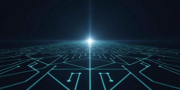 Glowing blue circuit lines converging at a bright central point on a dark surface.