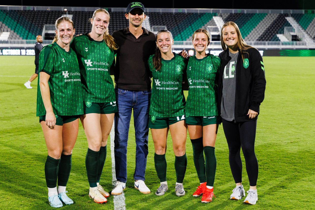 HSM founder Matt Hochberg with professional women's soccer players and clients