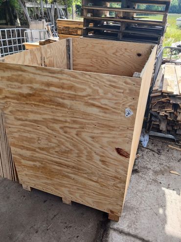 Custom plywood shipping crate built for bakery conveyor components and industrial equipment transpor