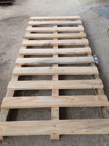 10 ft heat-treated skid with 4x4 stringers and 2x6 decking.