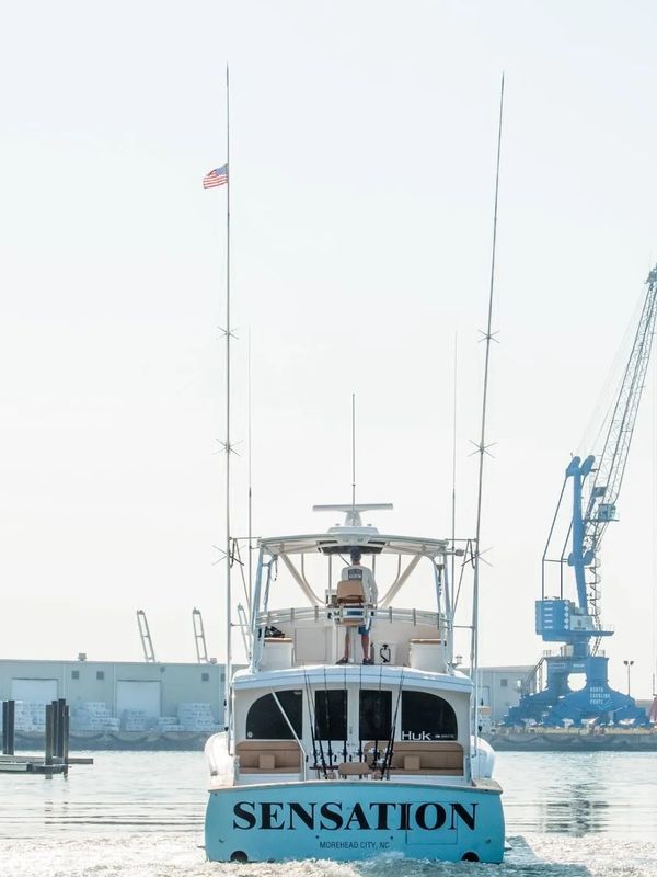 A picture of the sensation sporting fish boat on the water