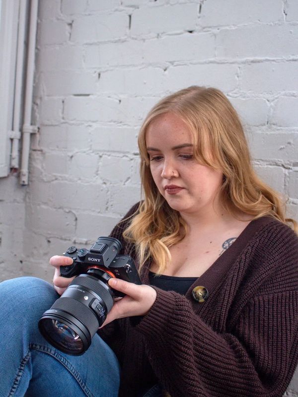 Bree checks over some images on her Sony a7iii camera