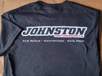 Black T-shirt with white and red logo.