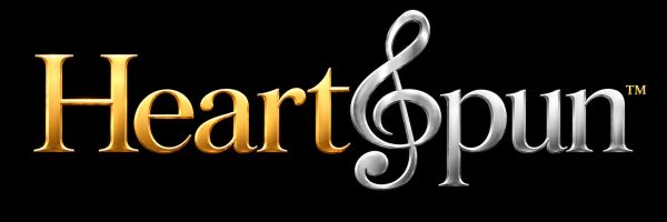 Logo for Heart &amp; Pun with gold and silver text.
