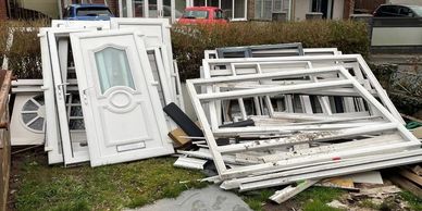 uPVC frames ready for recycling collection from installation job in Manchester 