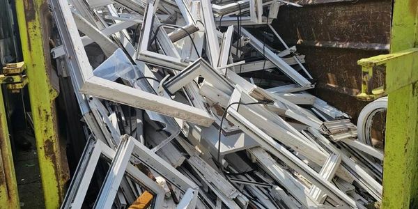 Trade uPVC window frames collected for recycling in Warrington 