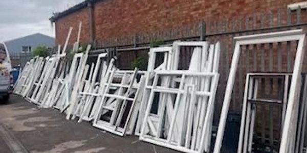 Large quantity of uPVC window frames prepared for commercial recycling in Greater Manchester