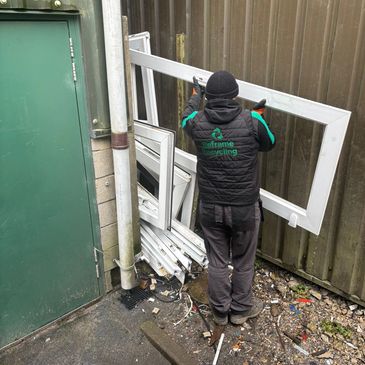 Reframe Recycling team collecting Scrap PVC window frames in Manchester