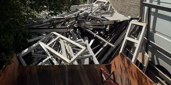 High volume uPVC window frame waste ready for recycling collection in the North West