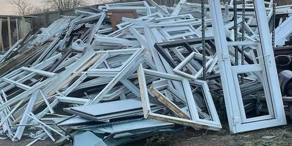 Trade uPVC window frame recycling collection at Warrington yard 