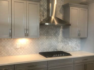 Kitchen Remodel Quartz Slab Counters, Backsplash Mosaic, Grey Shaker Cabinet