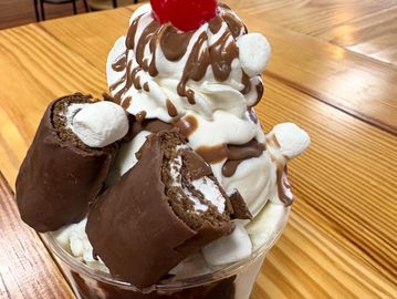 Ice cream sundae with chocolate and marshmallows.