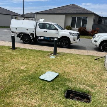 Work vehicle parked on site during a leak detection job in seaford.