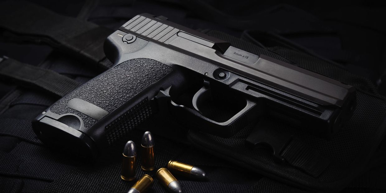Hand guns.