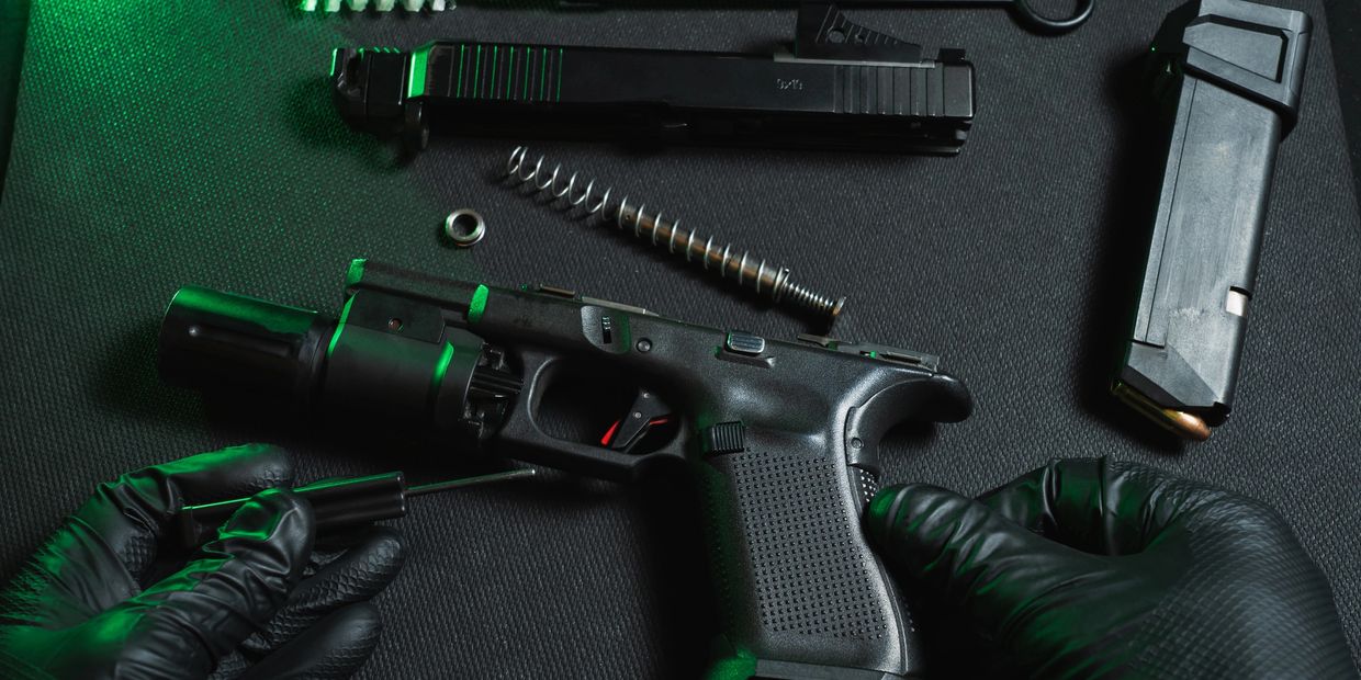 Weapon parts and cleaning supplies.