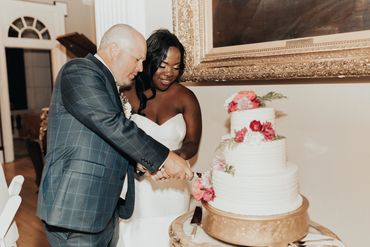 Wedding Couple Cutting the Cake at Grant Humphries Mansion, Denver, Colorado